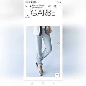 Garbe luxe Raw edge details, front pockets, cuffed hem. 100% supima cotton
